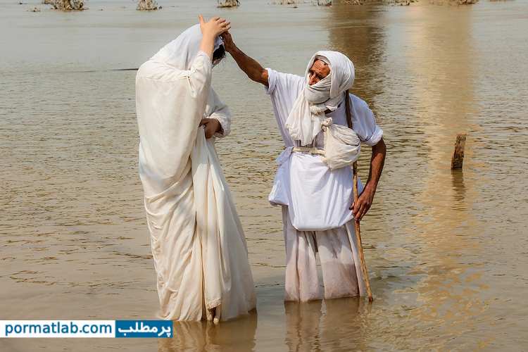 مراسم غسل تعمید فرقه مَنْدائیان در رودخانه کارون